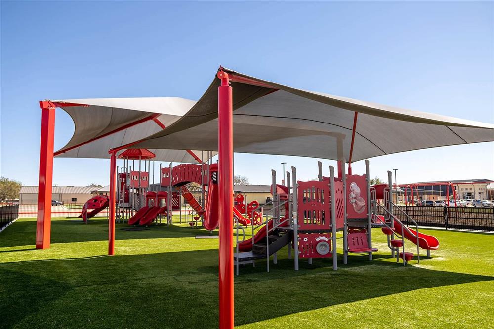 Weather protection over playgrounds with shade structures